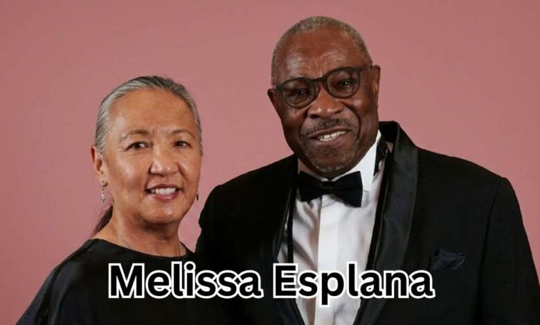 Melissa Esplana and Dusty Baker smiling together at a red carpet event in California.