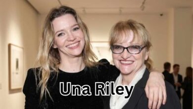Una Riley standing with her daughter, English actress Talulah Riley, at an event.