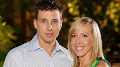 Denika Kisty and Jason Williams pose together for a portrait.