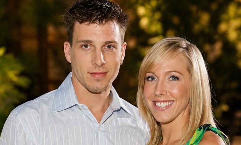 Denika Kisty and Jason Williams pose together for a portrait.