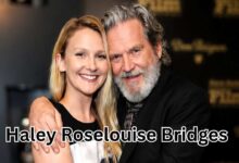Haley Roselouise Bridges smiling next to her father Jeff Bridges at a public event.