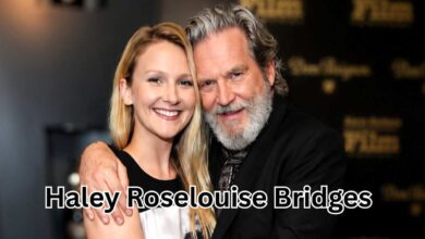 Haley Roselouise Bridges smiling next to her father Jeff Bridges at a public event.