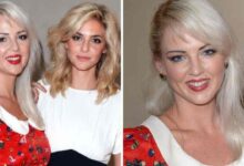 Sophia Egerton and her sister Tamsin Egerton smiling at a London red carpet event.
