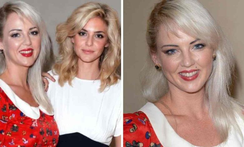 Sophia Egerton and her sister Tamsin Egerton smiling at a London red carpet event.